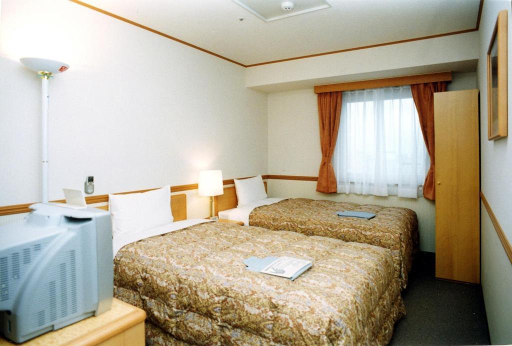 Toyoko Inn Niigata Ekimae Kamer foto